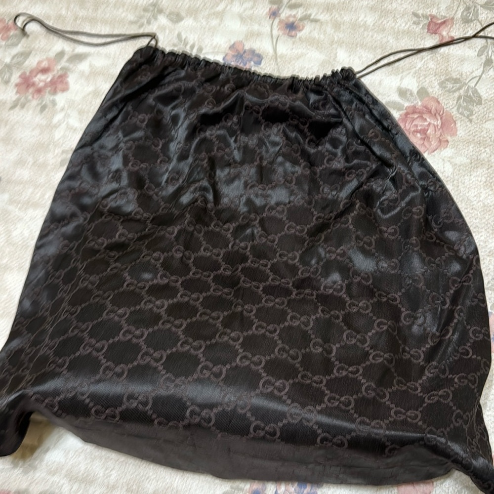 Gucci canvas gg logo handbag. Black. Nw/out tags. 5” wide x 8.5” high.